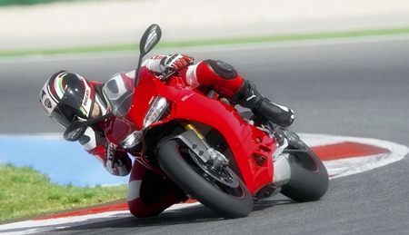 Knee down on the Ducati.